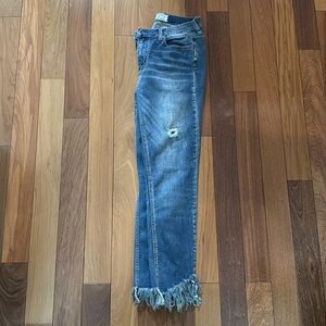 Free People denim jeans, fringe at the bottom, medium wash, size 28